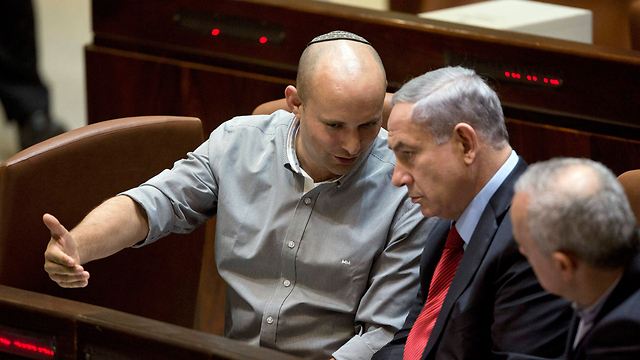 Naftali Bennett and Benjamin Netanyahu speaking during a Knesset session before the two fell out  