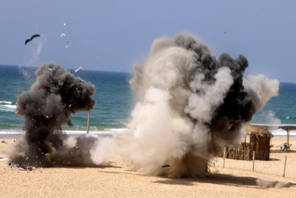Hamas fires a practice rocket out to sea from Gaza on Saturday after dozens of rockets were launched at Israel overnight (Photo: AFP) Hamas fires a practice rocket out to sea from Gaza on Saturday after dozens of rockets were launched at Israel overnight