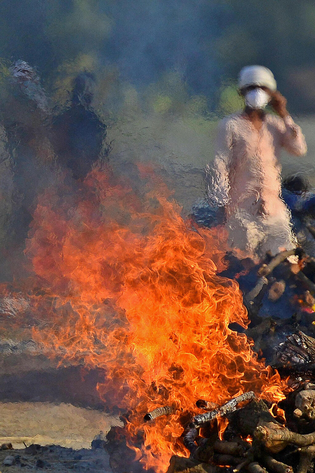 צילום: AFP שריפת גופות בפריאגראג', הודו