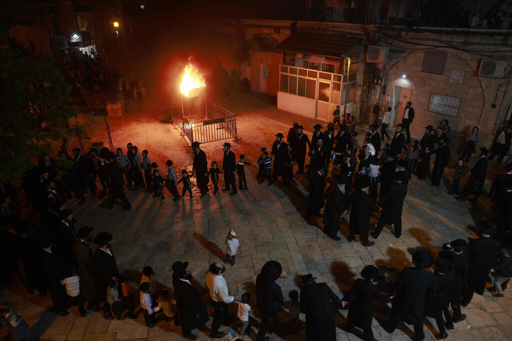 מדורות בירושלים (צילום: AFP) מדורות בירושלים