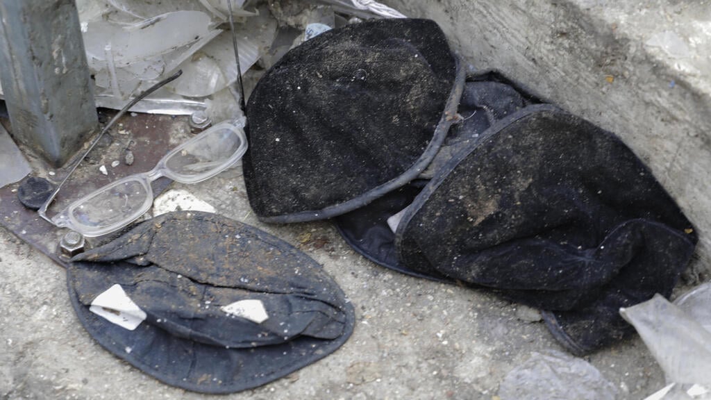 Personal belongings of worshippers killed in Meron disaster (Photo: AP) חפצים אישיים של המתפללים שנרמסו