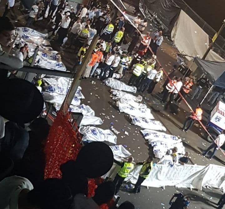 The bodies of the victims of the Meron disaster are lined up at the site 