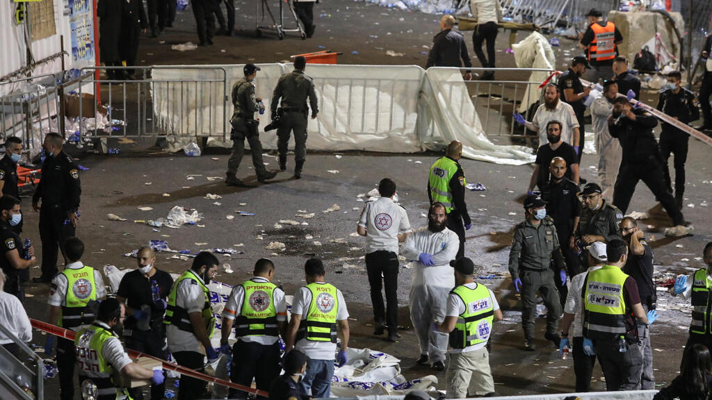 Medics and rescue workers attend to the Lag B'Omer event in Mount Meron 