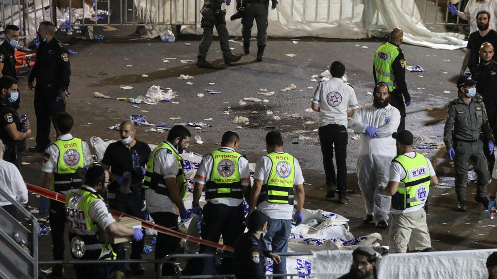 Medics and rescue workers at the scene of the Mount Meron disaster, April 30, 2021 (Photo: Reuters) Medics and rescue workers attend to the Lag B'Omer event in Mount Meron