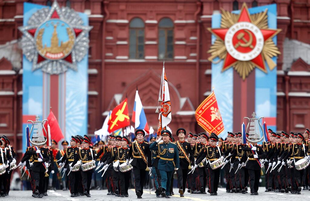 Russian service members and cadets march during a military parade on Victory Day, which marks the 76th anniversary of the victory over Nazi Germany in World War Two, in Red Square in central Moscow 