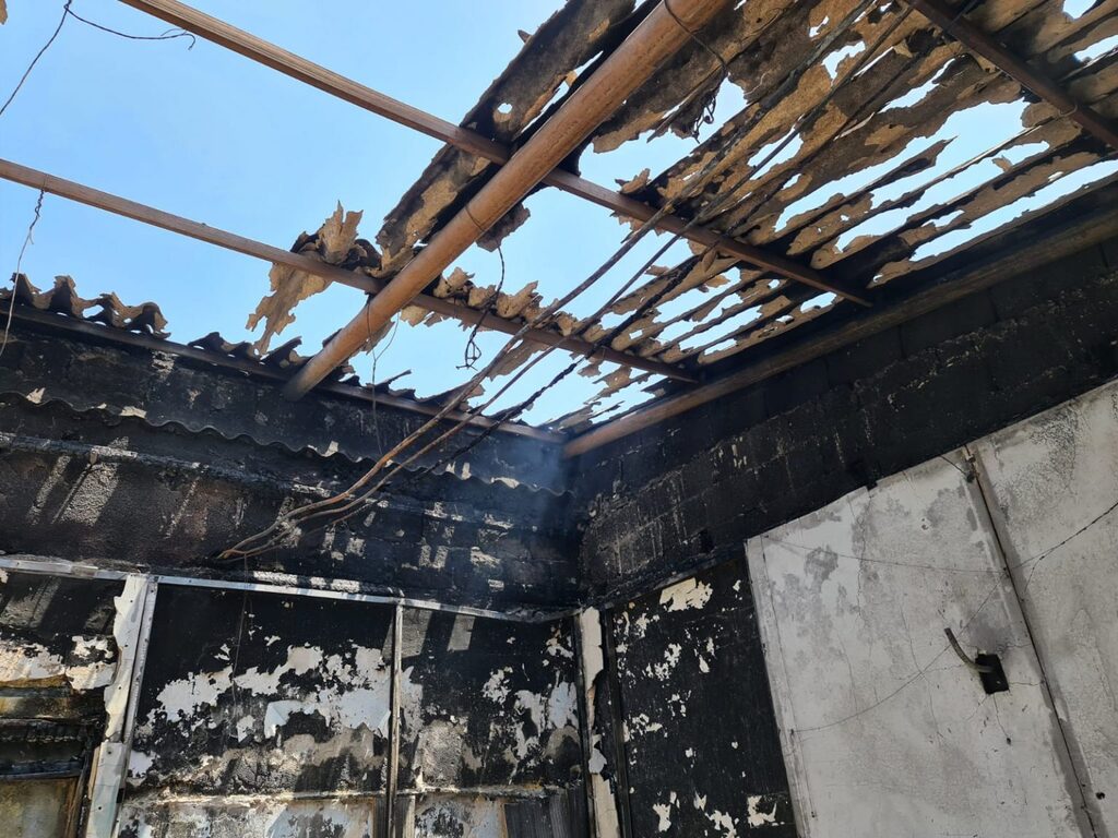 The charred remains of Beit Yisrael synagogue in Lod