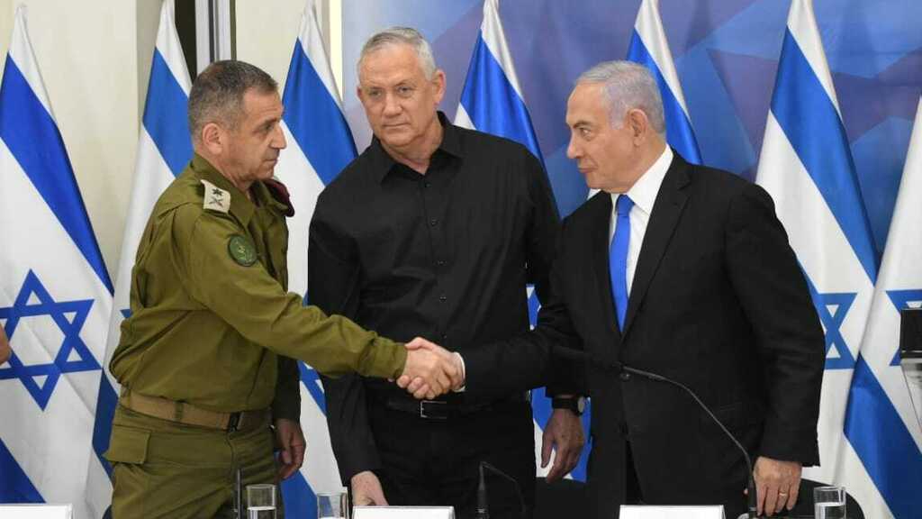 L-R: IDF Chief Lt. Gen. Aviv Kochavi, Defense Minister Benny Gantz and Prime Minister Benjamin Netanyahu at a press conference hours after the Gaza ceasefire took hold last Friday (Photo: GPO) בנימין נתניהו, נדב ארגמן, אביב כוכבי ובני גנץ בפגישה לאחר הפסקת האש
