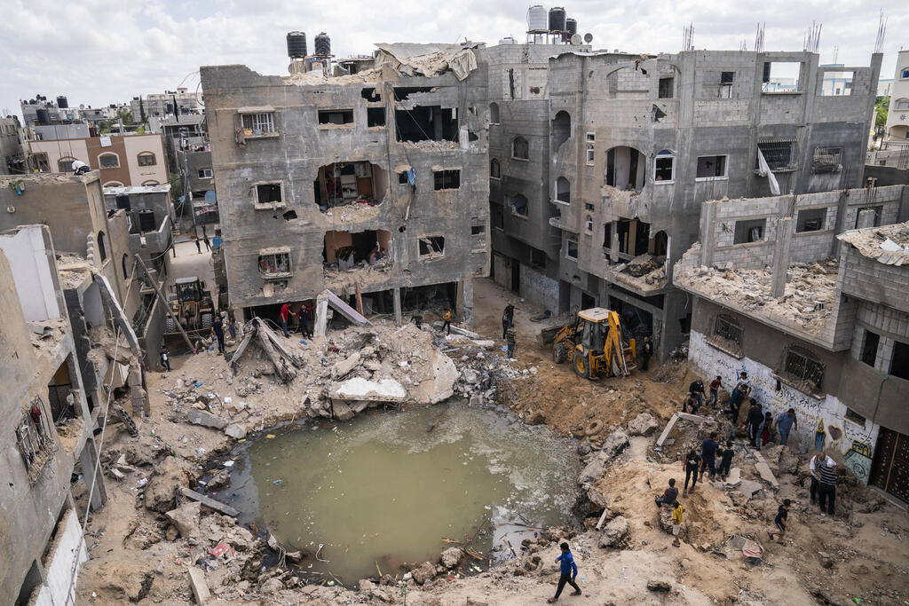 The aftermath of an IDF strike on Gaza earlier this month (Photo: AP) A crater remains where the al Masri home stood before it was destroyed in an Israeli strike onBeit Hanoun in the northern Gaza Strip