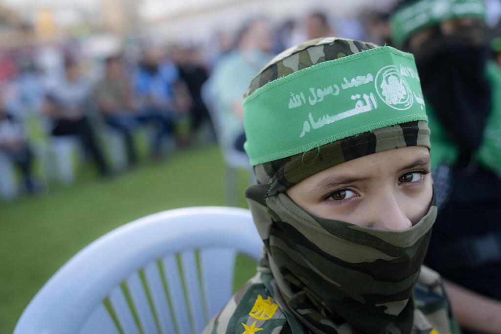 Gaza child in Hamas attire (Photo: AP) Children at a rally days after a cease-fire was reached in an 11-day war between Gaza's Hamas rulers and Israel