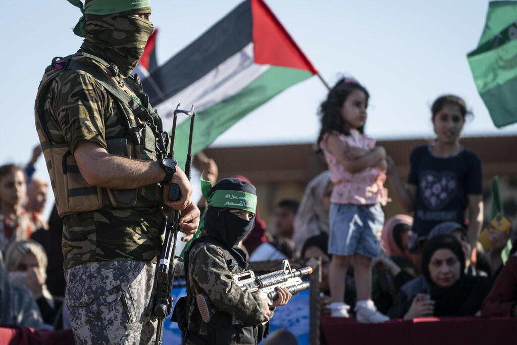 Children at a rally days after a cease-fire was reached in an 11-day war between Gaza's Hamas rulers and Israel 