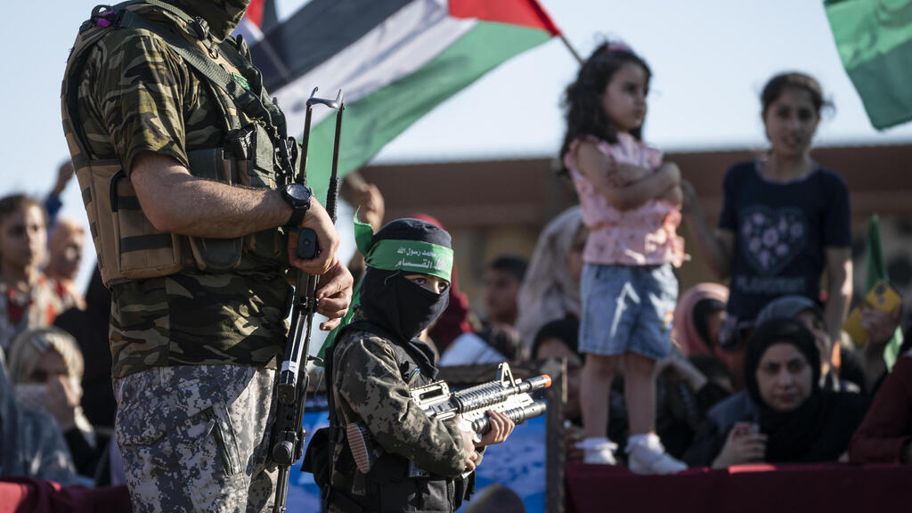 Children at a rally days after a cease-fire was reached in an 11-day war between Gaza's Hamas rulers and Israel (Photo: AP) Children at a rally days after a cease-fire was reached in an 11-day war between Gaza's Hamas rulers and Israel