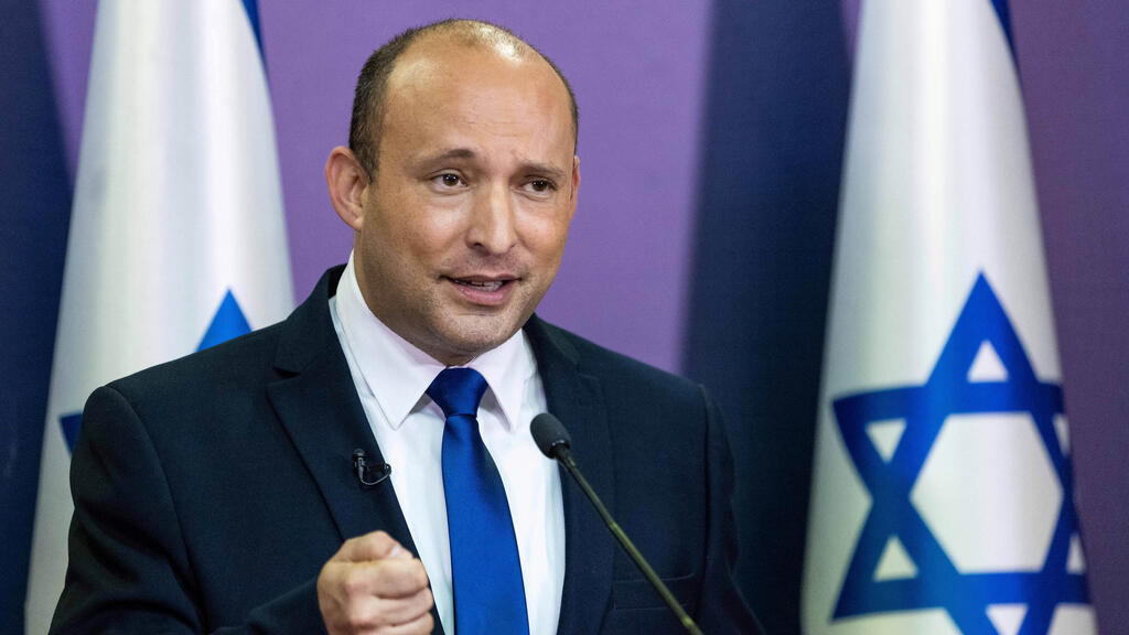 Yamina leader Naftali Bennett announcing his decision to join coalition for change on Sunday (Photo: Reuters) נפתלי בנט