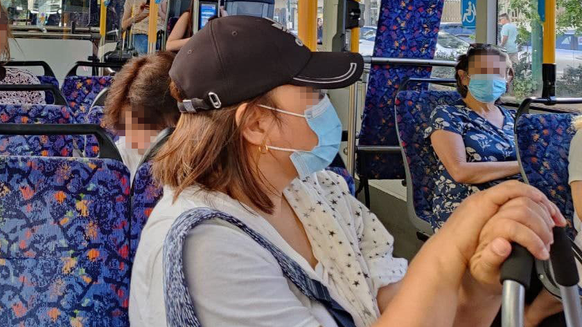 Passengers wearing masks on a bus even after the mask mandate was lifted 
