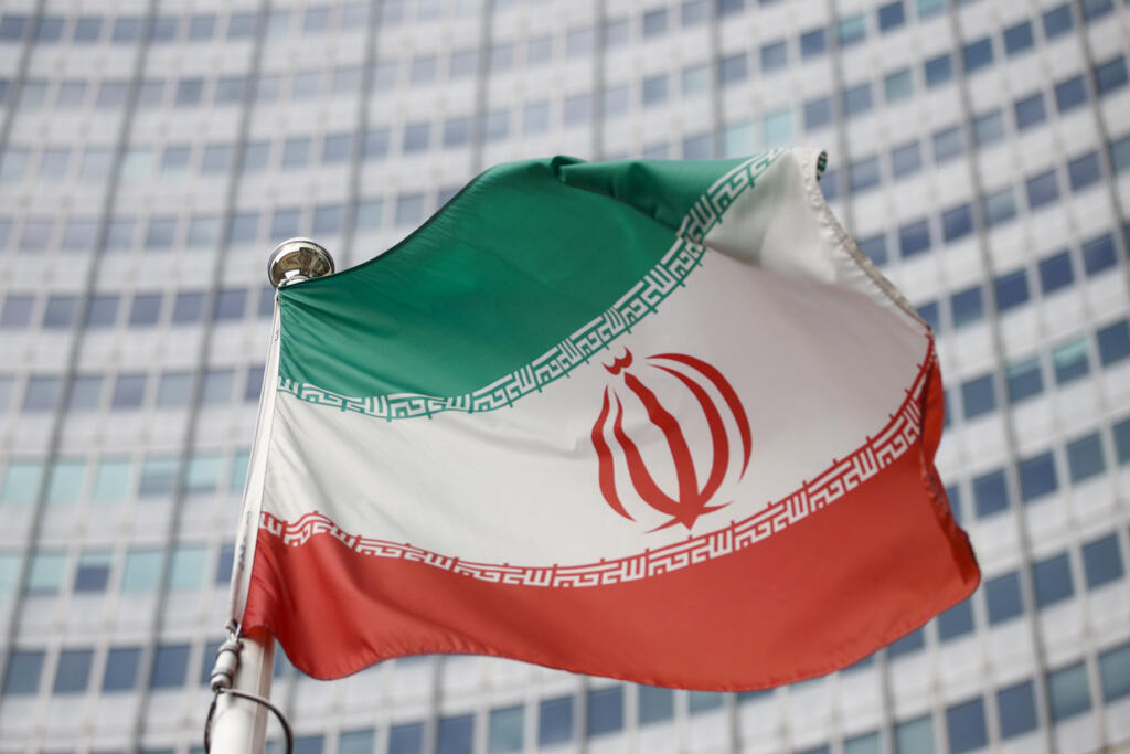 The Iranian flag waves in front of the International Atomic Energy Agency (IAEA) headquarters, before the beginning of a board of governors meeting, amid the coronavirus disease (COVID-19) outbreak in Vienna, Austria 