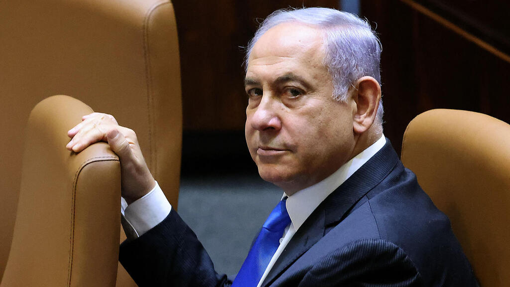 Benjamin Netanyahu in the Knesset on Sunday night as the new government was confirmed (Photo: AFP) השבעת הממשלה