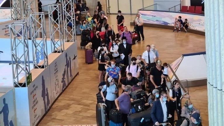 People line up to be tested for coronavirus at Ben Gurion airport on Sunday (Photo: Ynet) People line up to be tested for coronavirus at Ben Gurion airport on Sunday