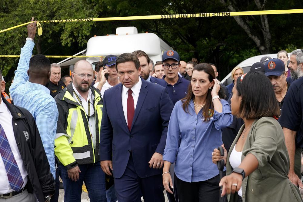 Florida Gov. Ron DeSantis, center left, arrives for a news conference near the scene (Photo: AP) Florida Gov. Ron DeSantis, center left, and Lt. Gov. Jeanette Nunez, center right, arrive for a news conference near the scene