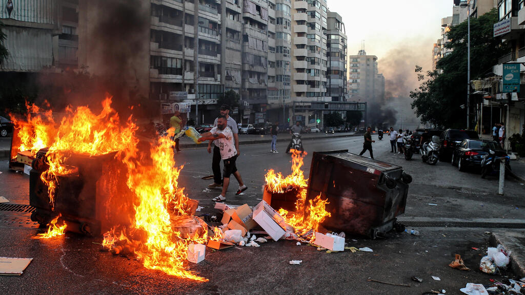 Lebanese citizens protest in Beirut over fuel shortages, July 2021 