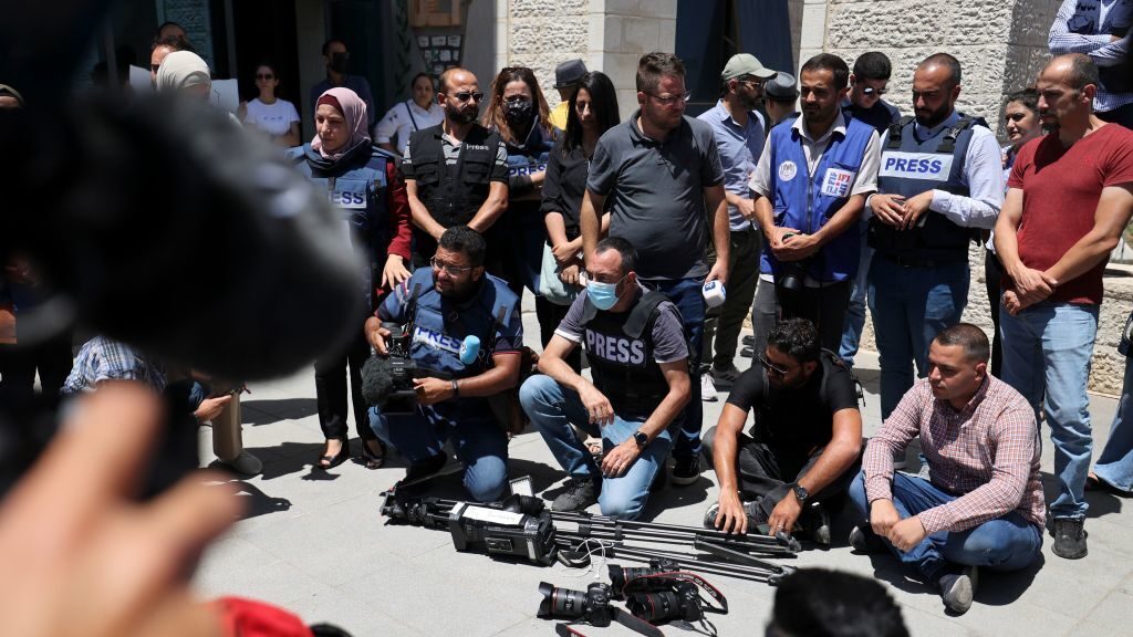Journalists protest at the UN office in Ramallah to demand protection following attacks by Palestinian security forces on their colleagues, June 28, 2021 