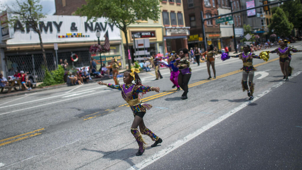 Dancers participate in a 4th of July parade on July 4, 2021 in Pottstown, Pennsylvania