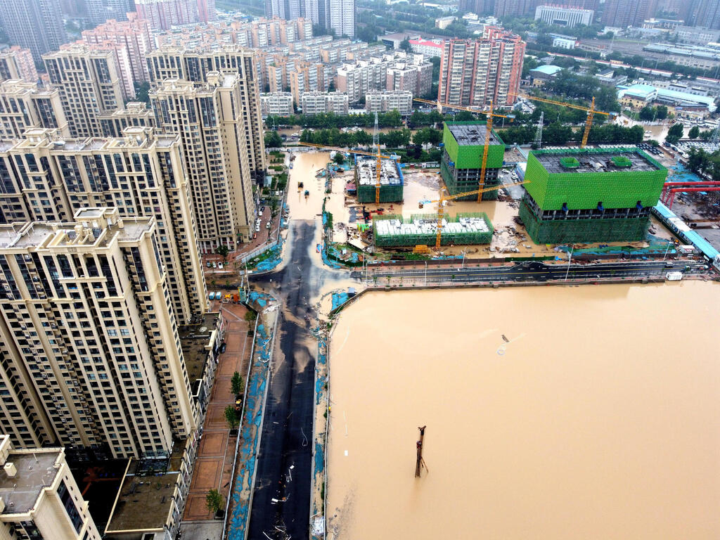 שיטפונות הצפות בעיר ג'נגג'ואו מחוז חנאן במרכז סין