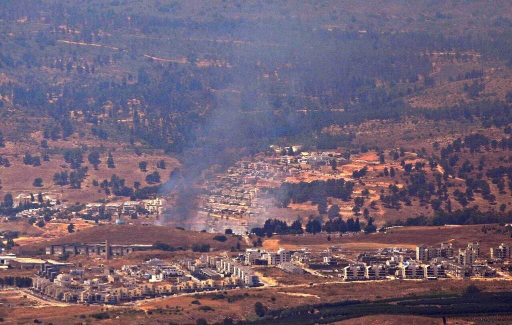 Smoke billows next to Kiryat Shmona following rocket fire from Lebanon, August 4, 2021 