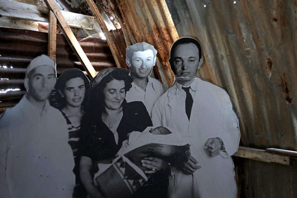 Cardboard cutout of a baby born at the British camp in Cyprus, at the Jewish museum of Cyprus in the port city of Larnaca on July 26, 2021