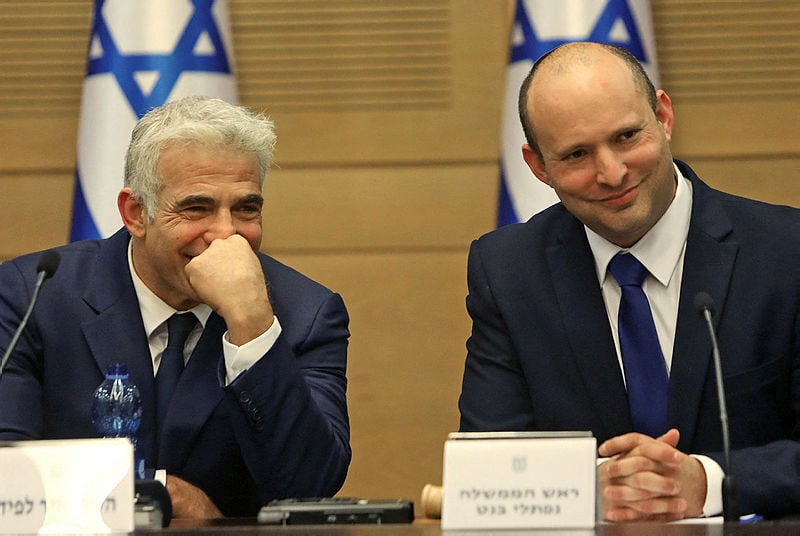 Foreign Minister Yair Lapid and Prime Minister Naftali Bennett (Photo: AFP) בנט ולפיד