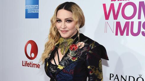 Madonna recovering at home following 'serious' hospitalization