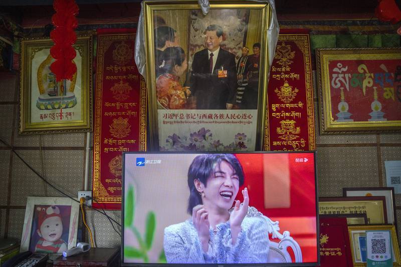 A television shows a broadcast of a Chinese talk show program as it sits beneath a photo of President Xi Jinping in a home converted into a tourist homestay in Zhaxigang village near Nyingchi in western China's Tibet Autonomous Region (Photo: AP) a television shows a broadcast of a Chinese talk show program as it sits beneath a photo of Chinese President Xi Jinping in a home converted into a tourist homestay in Zhaxigang village near Nyingchi in western China's Tibet Autonomous Region