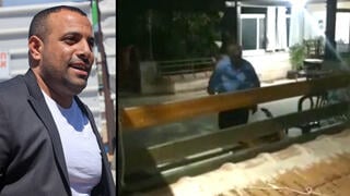 אביו של אביר קארה מאיים לירות במפגין מחוץ לביתו