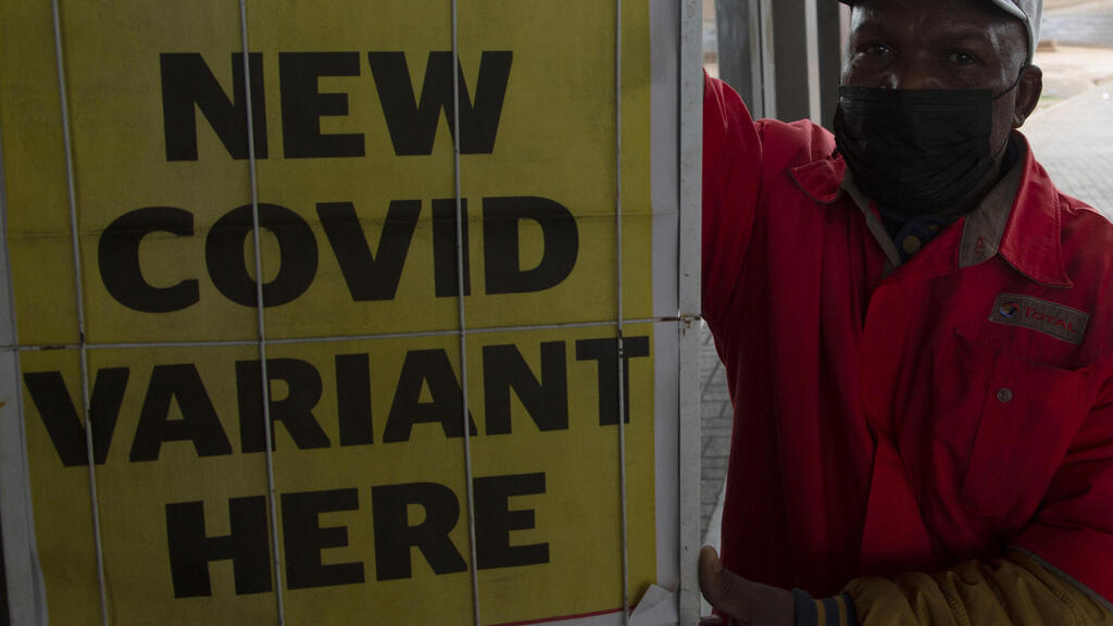 A petrol attendant stands next to a newspaper headline in Pretoria, South Africa (Photo: AP) A petrol attendant stands next to a newspaper headline in Pretoria, South Africa