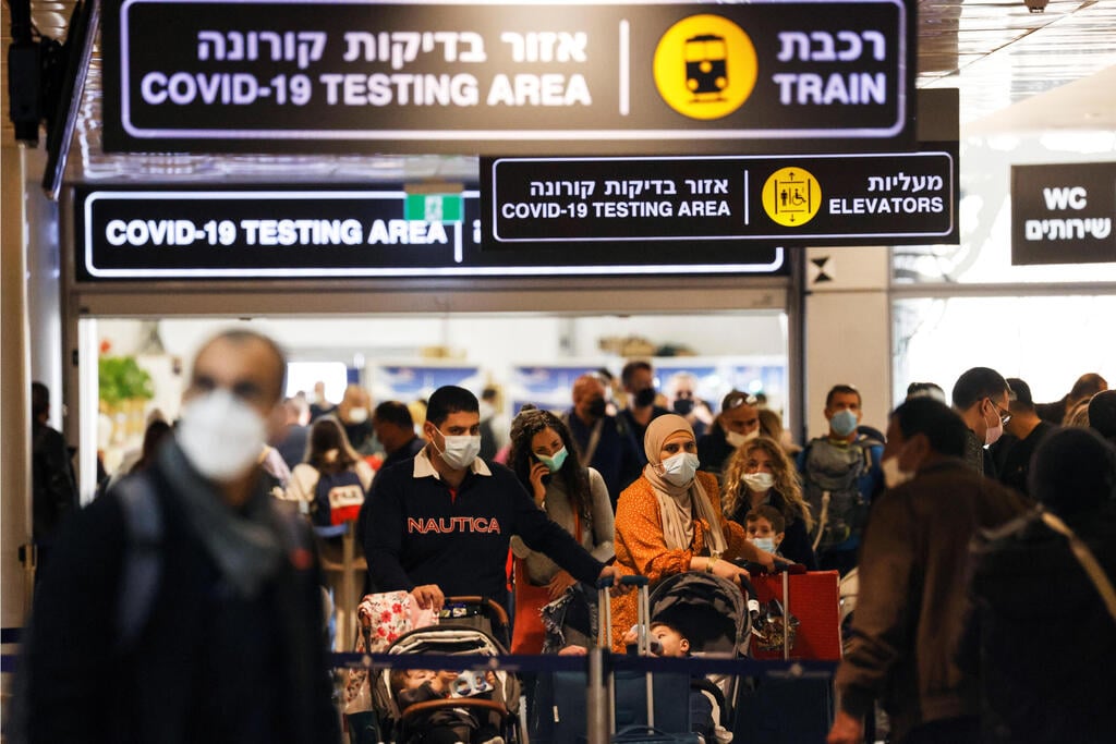 נוסעים בנתב"ג, בשבוע שעבר (צילום: רויטרס) נוסעים בנתב"ג