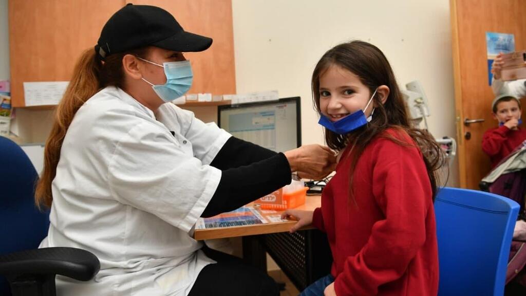 A child receives her coronavirus vaccine at a clinic in the West Bank settlement of Efrat (Photo: Yoav Dudkevich) מבצע חיסוני הילדים בישוב אפרת