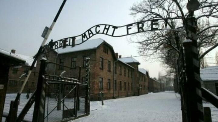 The sign "Arbeit macht frei" (Work makes you free) is pictured at the main gate of the former German Nazi concentration and extermination camp Auschwitz 
