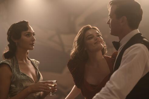 gal gadot death on the nile silver dress Review: 'Death On The Nile' Is An Entertaining Whodunit In Need Of Fine Tuning