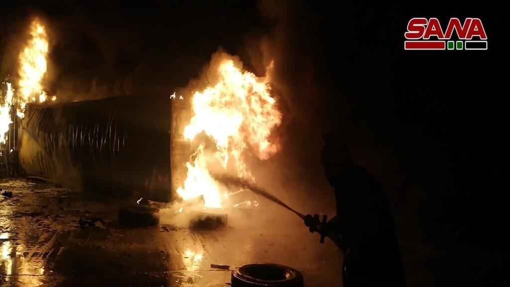 Fire breaks out at the Latakia port in Syria after an attack attributed to Israel early on Tuesday שריפה במתחם המכולות בנמל לטקיה שבסוריה