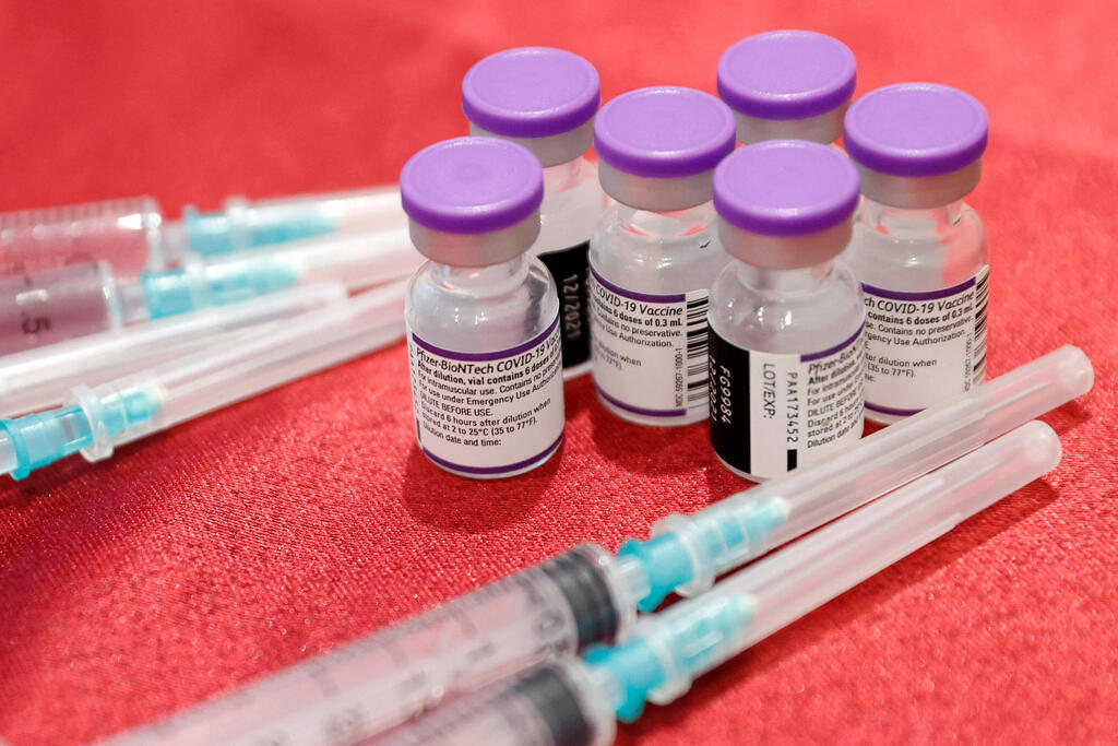 COVID vaccine (Photo: AFP) חיסון קורונה בנתניה