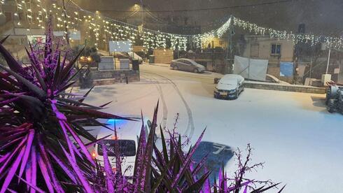 Stormy weather covers northern Israel white as Jerusalem sees first snow
