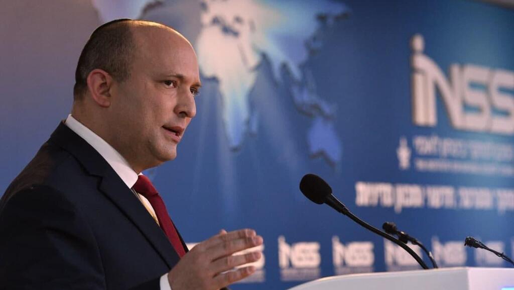Prime Minister Naftali Bennett speaking at the 15th annual conference of the Institute for National Security Studies (Photo: GPO) נפתלי בנט בכנס השנתי של INSS