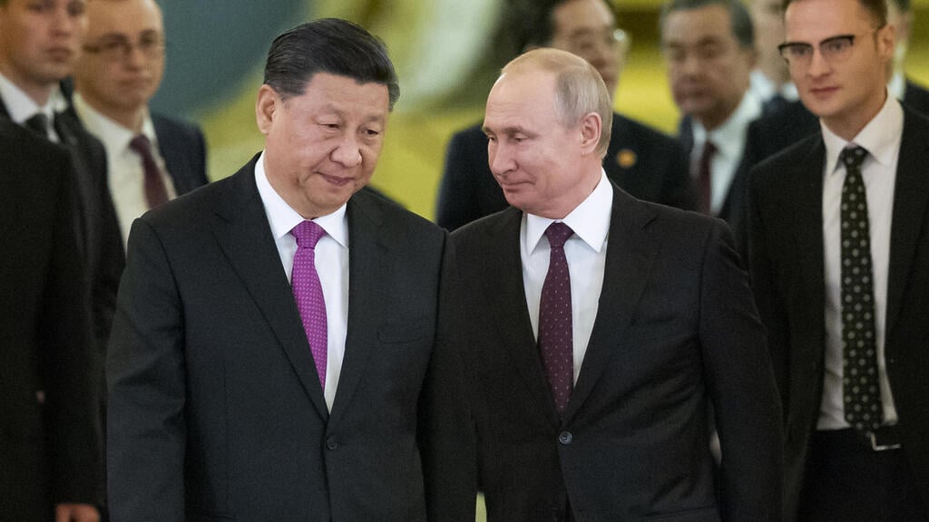 Chinese President Xi Jinping and Russian President Vladimir Putin in Beijing early last month (Photo: AFP) פגישת ולדימיר פוטין עם שי ג'ינפינג בבייג'ינג, סין