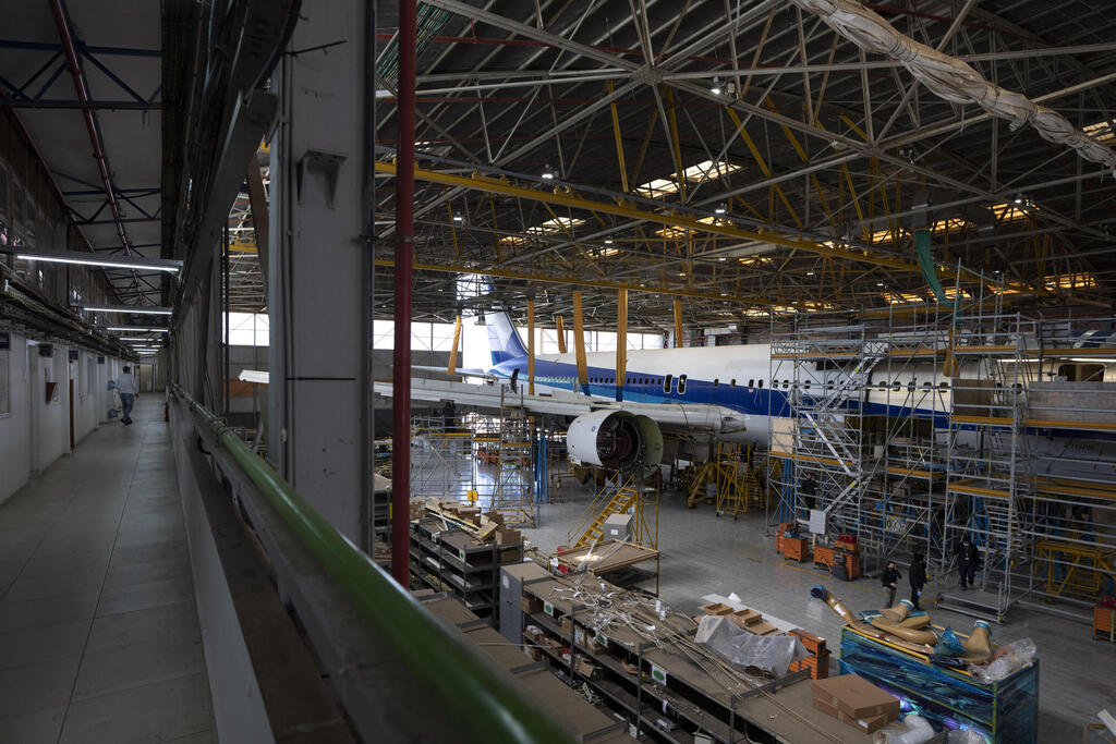 A Boeing 767 is undergoing conversion from passenger plane to a cargo plane 