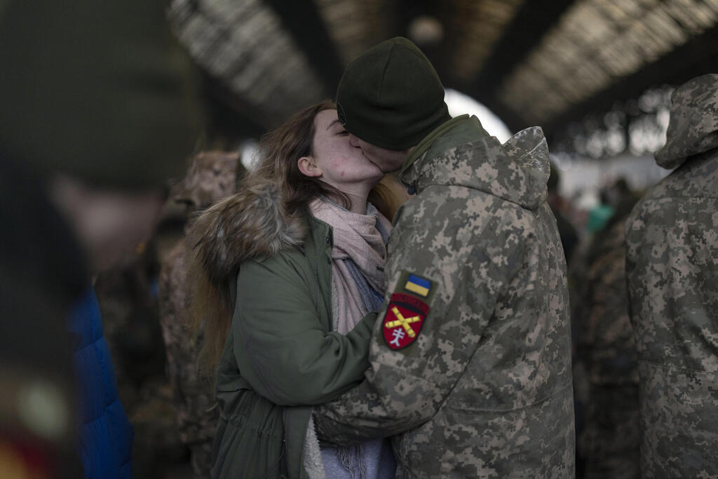 Couple bids farewell as the young man remains in Ukraine to fight against the Russian invasion 