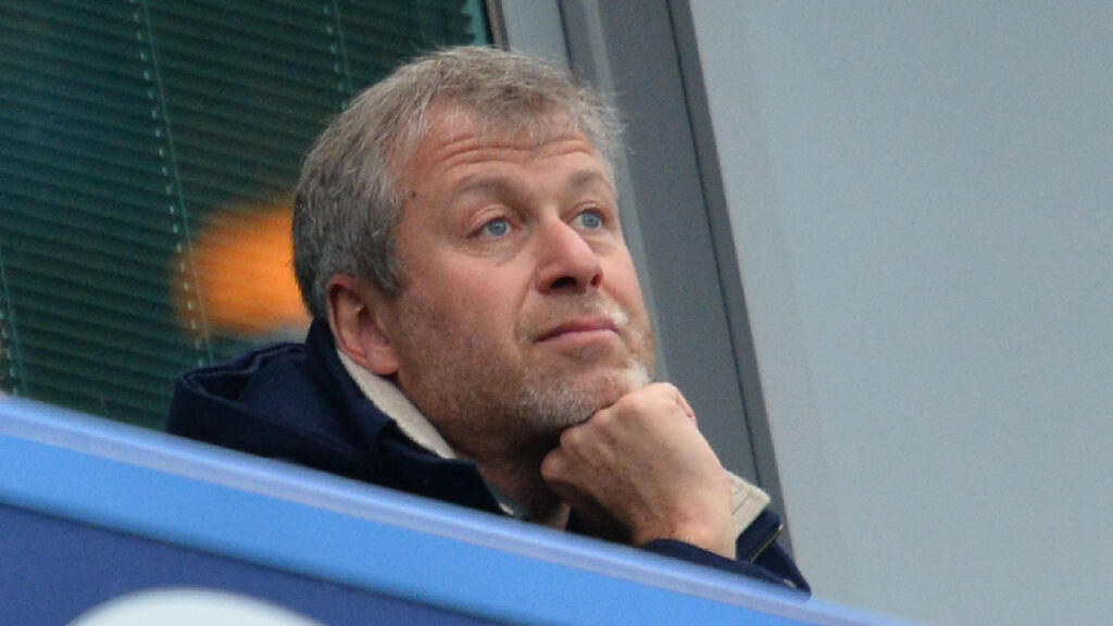Roman Abramovich watches the FA cup fifth round football match between Chelsea and Manchester City at Stamford Bridge in London