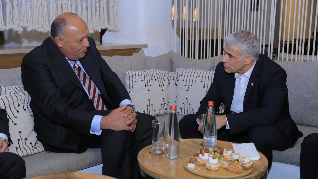Foreign Minister Yair Lapid with his Egyptian counterpart, Sameh Shoukry, March 27 (Photo: GPO) לפיד נפגש עם שר החוץ הבחרייני והמצרי