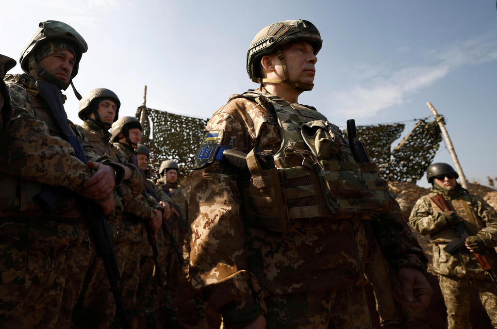 Colonel general Oleksandr Syrskyi commander of Ukraine ground forces visits troops north of Kyiv on Tuesday 