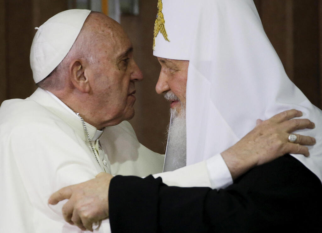Pope Francis, left, embraces Russian Orthodox Patriarch Kirill after signing a joint declaration on religious unity at the Jose Marti International airport in Havana, Cuba, Friday, February 12, 2016