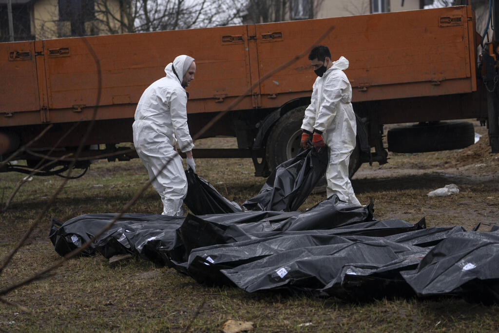 Bodies of Ukrainians taken from a mass grave near Kyiv for identification on Sunday (Photo: AP) Bodies of Ukrainians taken from a mass grave near Kyiv for identification on Sunday