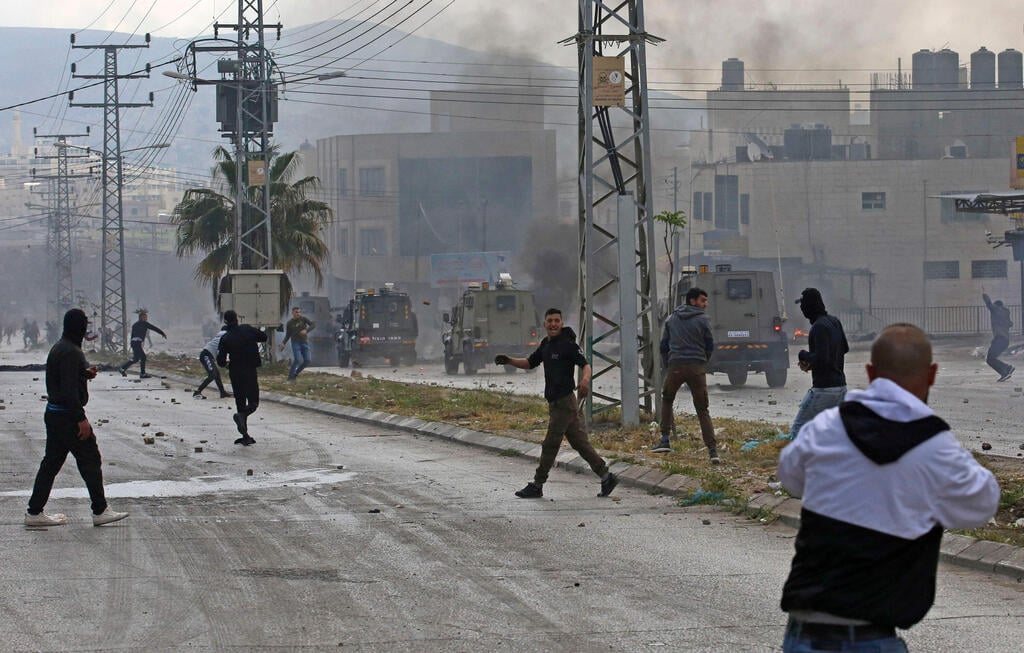 Clashes between Israeli forces and Palestinians in Nablus (Photo: AFP) עימותים בין פלסטינים לצה"ל בשכם