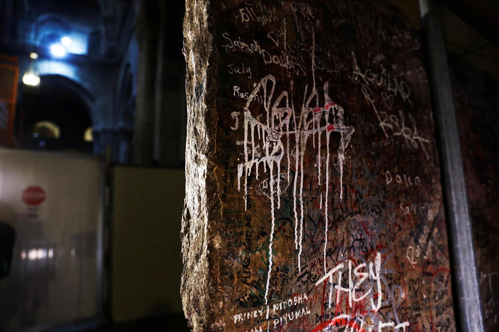 A stone slab said to be the decorated frontal of the Crusader-era high altar of the Church of the Holy Sepulcher (Photo: Reuters) A stone slab said to be the decorated frontal of the Crusader-era high altar of the Church of the Holy Sepulchre